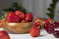 Ripe red strawberries lying on a wooden tray Royalty Free Stock Photo