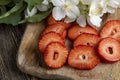 Ripe red strawberries lying on a wooden tray Royalty Free Stock Photo