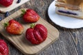 Ripe red strawberries lying on a wooden tray Royalty Free Stock Photo