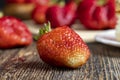 Ripe red strawberries lying on a wooden tray Royalty Free Stock Photo