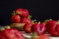 Ripe red strawberries lying on a wooden tray Royalty Free Stock Photo