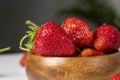 Ripe red strawberries lying on a wooden tray Royalty Free Stock Photo