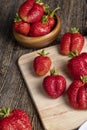 Ripe red strawberries lying on a wooden tray Royalty Free Stock Photo