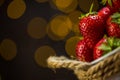 Ripe red strawberries in warm romantic colors with blur background.