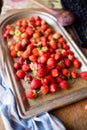Ripe red strawberry berries on the table, close-up food photos