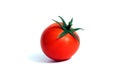Ripe red tomato on a white isolated background. Royalty Free Stock Photo