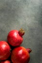 Ripe Red Vibrant Organic Pomegranates on Black Stone Background Poster Greeting Card Template Banner Autumn