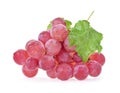 Ripe red wet grape with drops. Pink bunch with leaves isolated on white Royalty Free Stock Photo