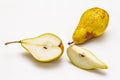 Ripe single pear. Fresh whole fruit, half sliced, seeds. Isolated on white background Royalty Free Stock Photo