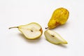 Ripe single pear. Fresh whole fruit, half sliced, seeds. Isolated on white background Royalty Free Stock Photo