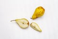 Ripe single pear. Fresh whole fruit, half sliced, seeds. Isolated on white background Royalty Free Stock Photo