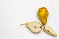 Ripe single pear. Fresh whole fruit, half sliced, seeds. Isolated on white background Royalty Free Stock Photo