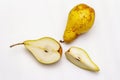 Ripe single pear. Fresh whole fruit, half sliced, seeds. Isolated on white background Royalty Free Stock Photo