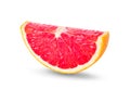Ripe slice of pink grapefruit citrus fruit isolated on white background. Royalty Free Stock Photo