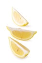 Ripe slice of yellow lemon citrus fruit isolated over white background Royalty Free Stock Photo