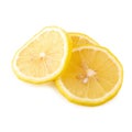 Ripe slice of yellow lemon citrus fruit isolated over white background Royalty Free Stock Photo