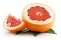 Ripe Sliced Grapefruit with Leaves Isolated Royalty Free Stock Photo