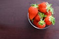 Ripe strawberries on glass over wooden background,copy space ,top view and on people Royalty Free Stock Photo