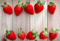 Ripe strawberries over wooden background,copy space ,top view and on people Royalty Free Stock Photo