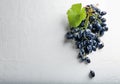 Ripe sweet grapes on white textured background, top view Royalty Free Stock Photo