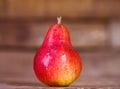 Ripe sweet pears on a wooden background. Royalty Free Stock Photo
