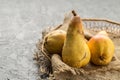 Ripe and sweet pears on wooden table.