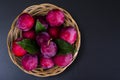 Ripe sweet plums in wicker bowl. Photo Royalty Free Stock Photo