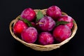 Ripe sweet plums in wicker bowl. Photo Royalty Free Stock Photo