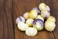 Ripe tomatillo Physalis, Mexican husk tomato on wooden table