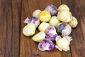 Ripe tomatillo Physalis, Mexican husk tomato on wooden table Royalty Free Stock Photo