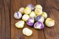 Ripe tomatillo Physalis, Mexican husk tomato on wooden table Royalty Free Stock Photo