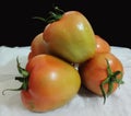 Ripe tomatoes on the background. Fresh big tomato fruit images Royalty Free Stock Photo