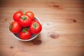 Ripe tomatoes in bowl