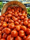 Ripe tomatoes in bushel basket