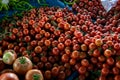 Ripe tomatoes on display at farmer`s market on summer day. Royalty Free Stock Photo