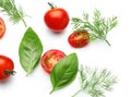 Ripe tomatoes with fresh herbs on white background Royalty Free Stock Photo