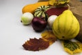 Ripe vegetables and yellow, autumn leaves on a white background Royalty Free Stock Photo