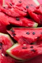 ÃÂ ripe watermelon with black seeds sliced. Close-up. Royalty Free Stock Photo