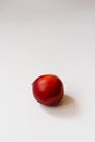 Ripe whole peach nectarine fruit on a white background with copying space Royalty Free Stock Photo