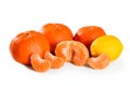 Ripe whole and peeled mandarin and lemon citrus fruit isolated on white background macro Close-up Royalty Free Stock Photo