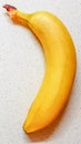 Ripe yellow banana on the white marble table