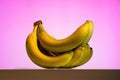 Ripe Yellow Bananas Bunch Modern Pink Royalty Free Stock Photo