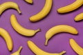 Ripe yellow bananas on purple background, flat lay Royalty Free Stock Photo
