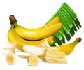 Ripe yellow bananas with slices and leaves.