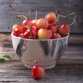 Ripe yellow cherries in wooden bowls Royalty Free Stock Photo