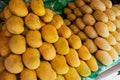 Ripe yellow mango pile on market stall. Asian fruit market stall. Philippine mango season. Fresh fruit for sell. South Asia Royalty Free Stock Photo