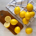 Ripe Yellow Organic Lemons on a white wooden background, top view. Flat lay, overhead, from above Royalty Free Stock Photo