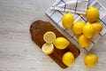 Ripe Yellow Organic Lemons on a white wooden surface, overhead view. Flat lay, top view, from above. Space for text Royalty Free Stock Photo