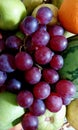 Ripen grapes on a fruit basket Royalty Free Stock Photo