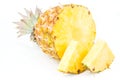 Ripes Pineapple with slices isolated on white Royalty Free Stock Photo